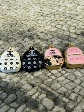 4 CHANEL Mini Backpack Charm Set - White, Black, Pink